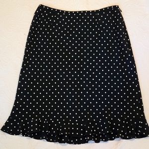 Anne Klein size 8 B&W flare hem knee length skirt. Sheer Polk dot over liner.